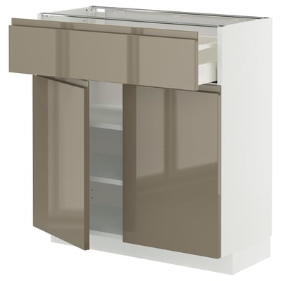 Modern kitchen cabinet in high gloss dark grey-brown with sleek, integrated handles, featuring a drawer and adjustable shelves.