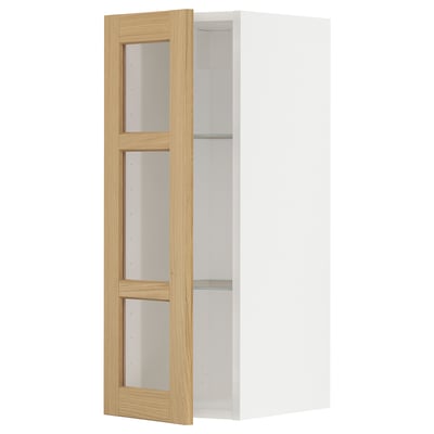 White METOD wall cabinet with oak veneer glass doors, rectangular shape, three shelves, classic kitchen design.