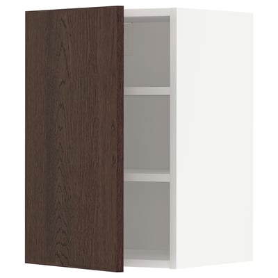Dark brown oak cabinet, single door open revealing shelves.