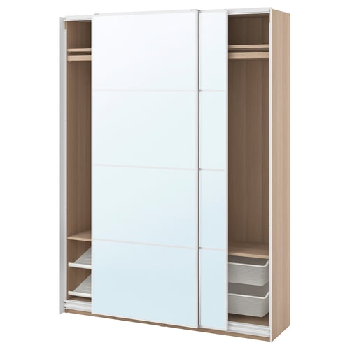 PAX wardrobe: white sliding doors reveal wooden shelves and mesh baskets, modern and organised.