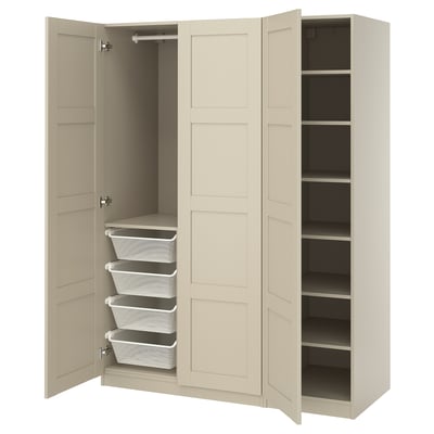 An off-white ikea PAX wardrobe with open doors revealing shelves and mesh drawers.