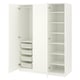 White ikea PAX wardrobe with open doors, mesh baskets, and adjustable shelves.