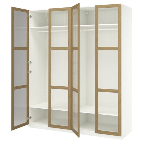 A white ikea PAX wardrobe with oak accents and frosted glass in a modern design, featuring three sections with shelves and rails.