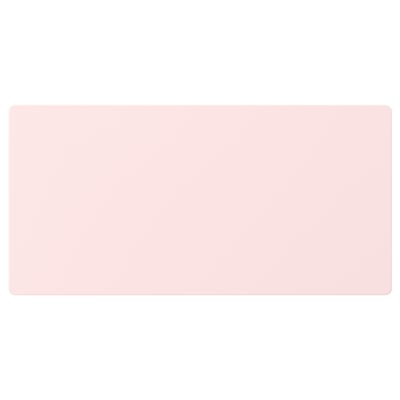 Image shows a light pink rectangular object, shaped like a drawer, representing SMÅSTAD storage furniture.