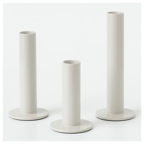 Three white TUVKORNELL candle holders, cylindrical, varying heights, in eva foam, by hagberg siblings.