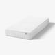 A VÅLFJÄLLET white mattress, rectangular, with quilted white cover, lying flat.