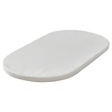 A white ÄLSKVÄRD baby mattress, oval-shaped with a smooth, simple design, perfect for a bassinet.