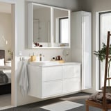 Modern white bathroom suite with glossy cabinet, marble sink, mirror cabinet, ample storage.