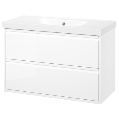 Modern white bathroom vanity with glossy finish, two drawers, and integrated handles.