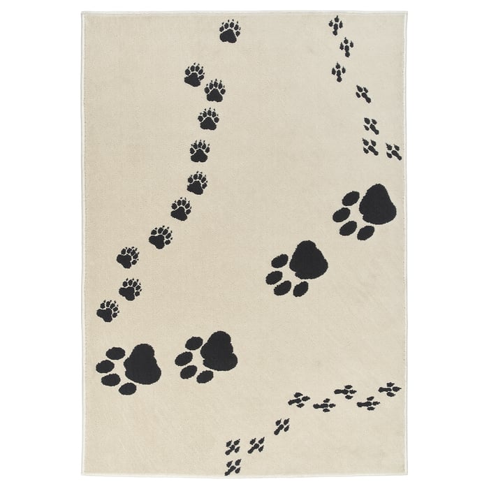 ALPTALL rug, beige/paw print pattern, 90x130 cm