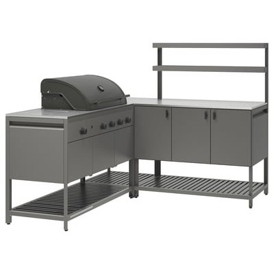 Outdoor kitchen set with grey metal units and black grill. Includes storage, shelves, and a side burner.