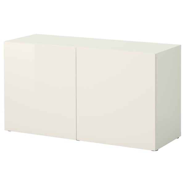 An IKEA BESTÅ white storage cabinet with a minimalist design, crafted from particleboard and fiberboard.