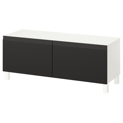 A white and black BESTÅ tv bench with two doors and adjustable shelves, featuring a modern design.