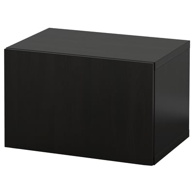 This is an IKEA BESTÅ black storage unit, rectangular in shape with smooth surfaces and clean lines, made from particleboard and recycled materials.