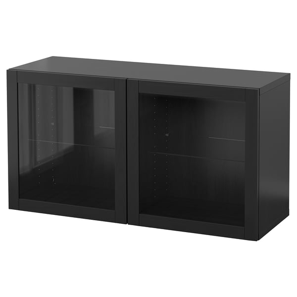 Black IKEA BESTÅ storage unit, rectangular, glass doors, dark wood.