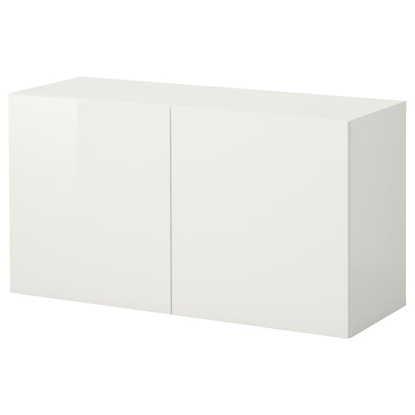 A white BESTÅ storage unit with a high gloss finish, rectangular shape, and two doors.
