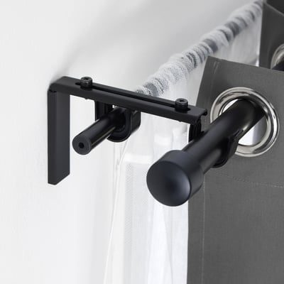 Black curtain rod holder with anti-slip.