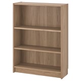 Displays a BILLY bookcase in light brown wood finish, featuring three shelves with a simple and timeless design.