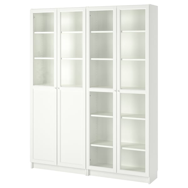 A white BILLY bookcase with glass doors, featuring adjustable shelves.