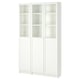A white BILLY bookcase with glass doors, featuring multiple adjustable shelves.