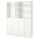 White BILLY bookcase with glass and solid doors, adjustable shelves.