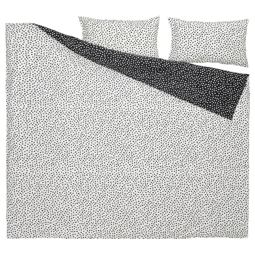 Black and white polka dot duvet set, including cover and pillowcases, featuring a blend of cotton and viscose.