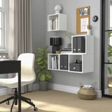 Home office with EKET shelves, desk, chair, plant, and basket.