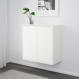 Wall-mounted white cabinet with 2 doors, minimalist design and push-openers for efficient home storage.