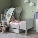 Childs bedroom with ELDFLUGA play tent, plush elephant, striped shirt on hook