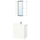 White floating bathroom vanity with drawers, chrome tap, and wall-mounted mirror cabinet.