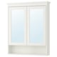 A white HEMNES mirror cabinet with two doors and a glass shelf. It’s rectangular with clean lines and a modern design, perfect for bathroom storage.