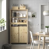Cosy IVAR kitchen storage with mugs & decor.