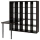 An ikea KALLAX black bookshelf with an attached table.