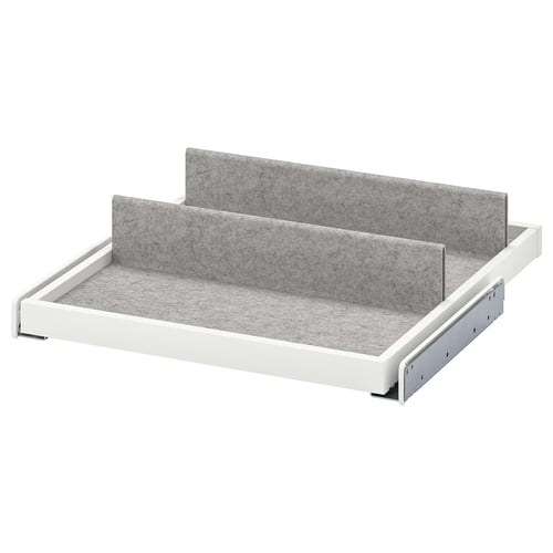 A white KOMPLEMENT pull-out tray with grey felt lining. It two adjustable dividers and has a sleek, modern design.