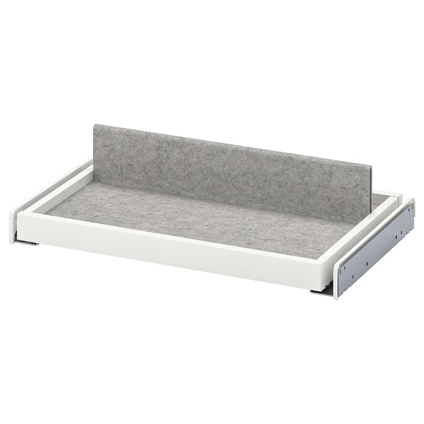 A white KOMPLEMENT pull-out tray with felt lining.