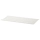 A white KOMPLEMENT shelf, rectangular in shape, with a slanted design and contoured edges, made of powder-coated steel.
