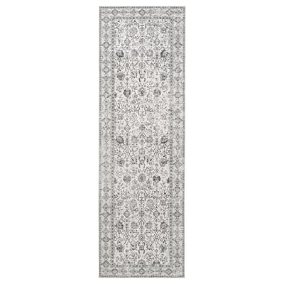 A LOKALTÅG rug. Its grey, rectangle-shaped, with intricate floral designs on a polyester surface.
