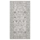 A grey LOKALTÅG rectangular rug with an ornate floral pattern. Its made from recycled polyester and synthetic rubber.