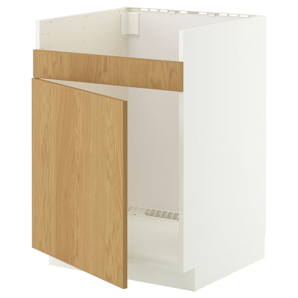 A METOD kitchen cabinet in white with a wooden door.