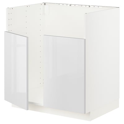 Modern white kitchen unit, sleek glossy finish, square shape, and clean design.