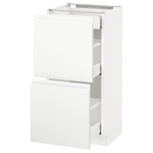 Modern white METOD kitchen cabinet with sleek design and integrated handles.
