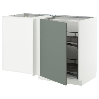 A white METOD corner kitchen cabinet with a green-gray door open, revealing interior shelves.