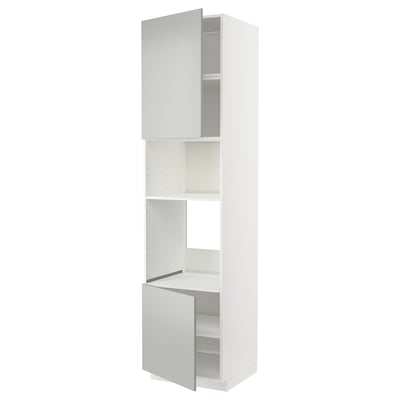 A white METOD kitchen cabinet with open doors, featuring a modern clean design with multiple storage shelves.