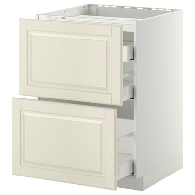 An ikea METOD off-white kitchen cabinet with traditional beveled edges and two partial drawers.