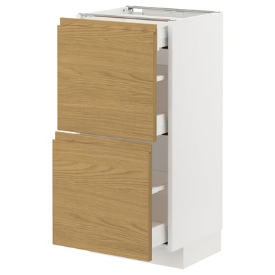 A white and light brown kitchen cabinet with two drawers in a minimalist design.