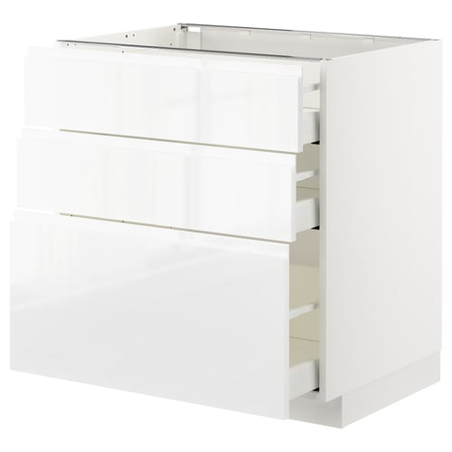 Modern white kitchen cabinet with three smooth-drawer, angled view.
