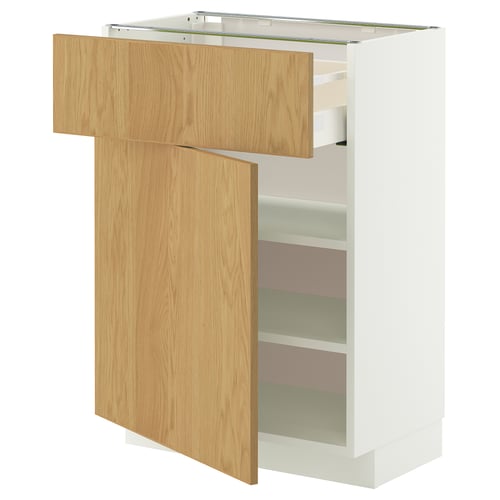 A METOD kitchen unit with a light wood finish and white cabinet sides, featuring an open drawer and shelves.