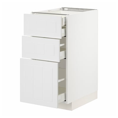 White METOD kitchen cabinet with three drawers and two doors.