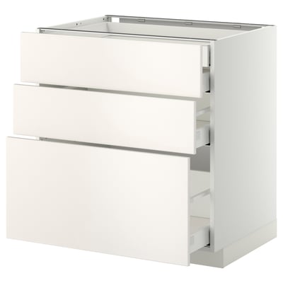 White METOD kitchen cabinet with three smooth drawers, sleek and modern design.