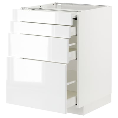 A white METOD cabinet with multiple pull-out drawers in a modern kitchen setup.